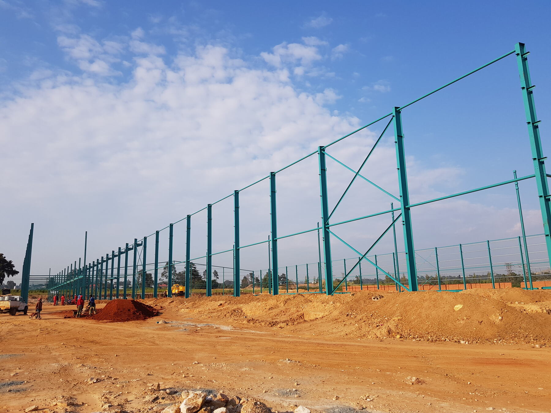 Steel portal frames erected for a new industrial factory built by RNC Group as main contractor