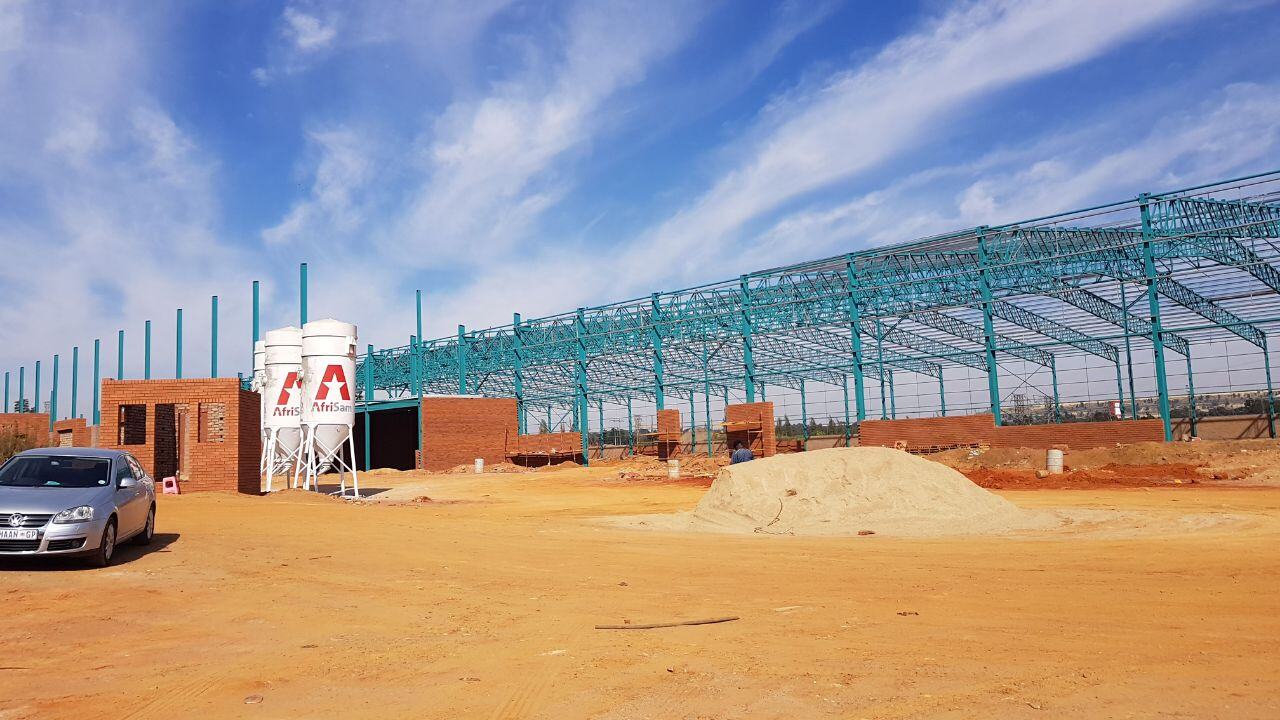 Warehouse steel frame with brick infill on an RNC Group main contract development